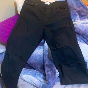 High waisted black mom jeans. Distressed style